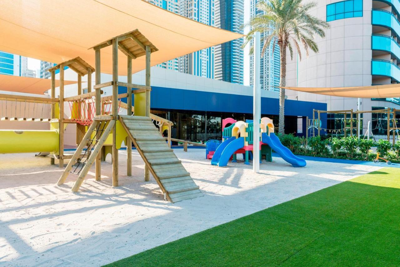 Le Meridien Mina Seyahi Beach Resort & Waterpark Dubái Exterior foto Children's play area