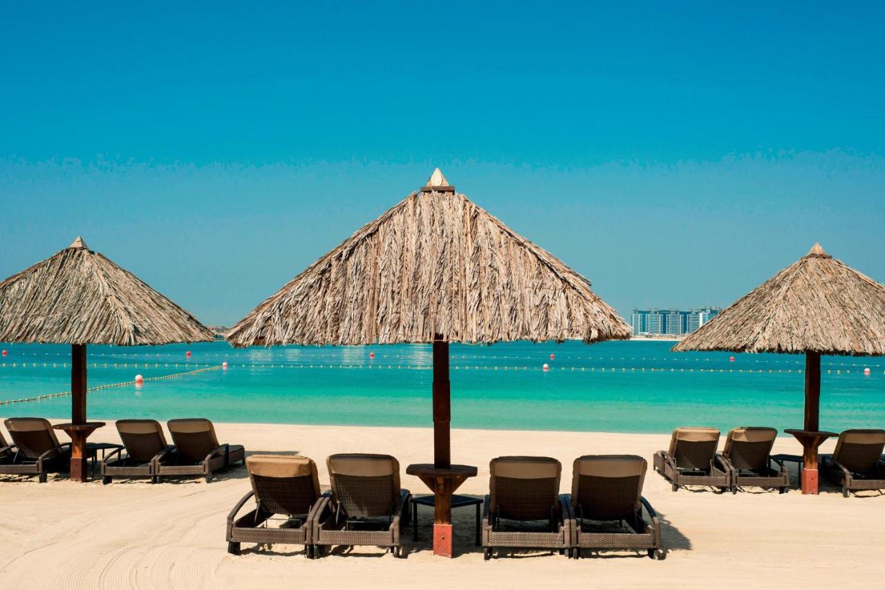Le Meridien Mina Seyahi Beach Resort & Waterpark Dubái Exterior foto Beach at Jumeirah Beach Hotel