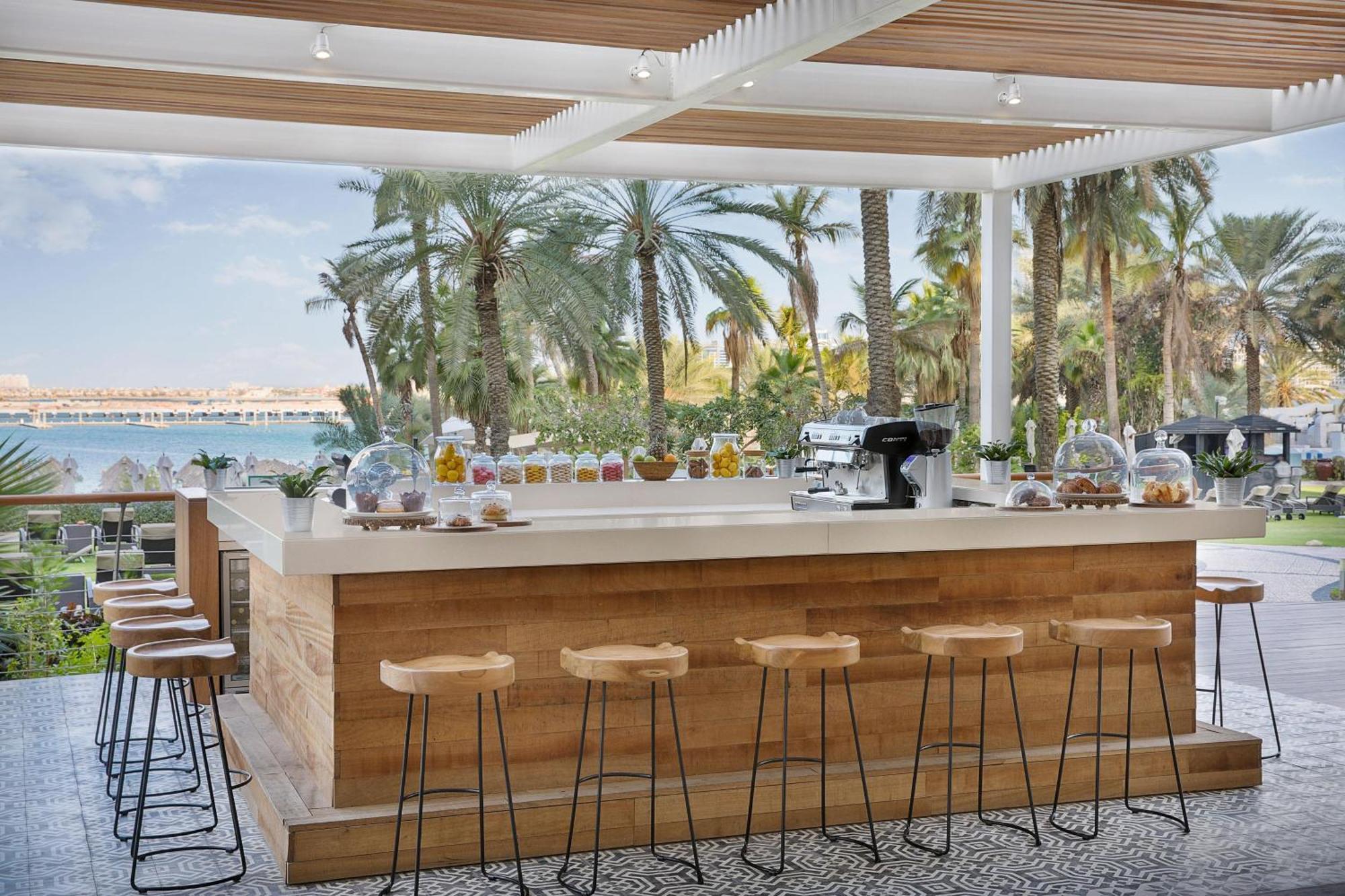 Le Meridien Mina Seyahi Beach Resort & Waterpark Dubái Exterior foto The Beach Bar